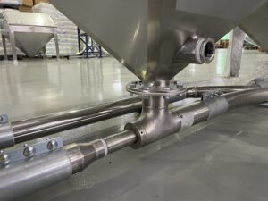 Venturi system installed in MACTEX's pneumatic conveying setup, designed for efficient airflow and material transport in powder handling applications.