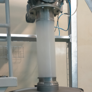 Flexible sleeve installed in a pneumatic conveying system, used in MACTEX for secure material transfer and preventing leakage during bulk material handling.